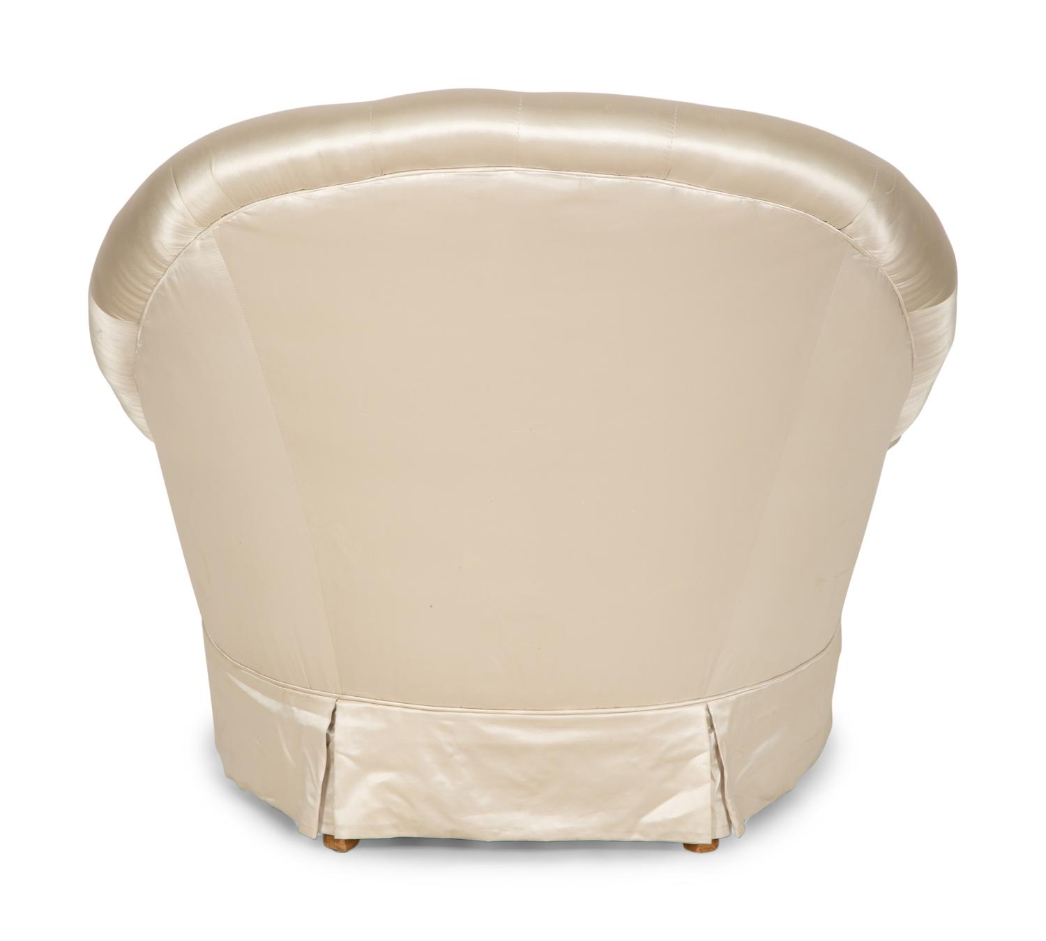 A Button-Tufted Silk-Upholstered Skirted Lounge Chair