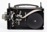 A Cine-Kodak Camera. Length 8 1/2 inches.