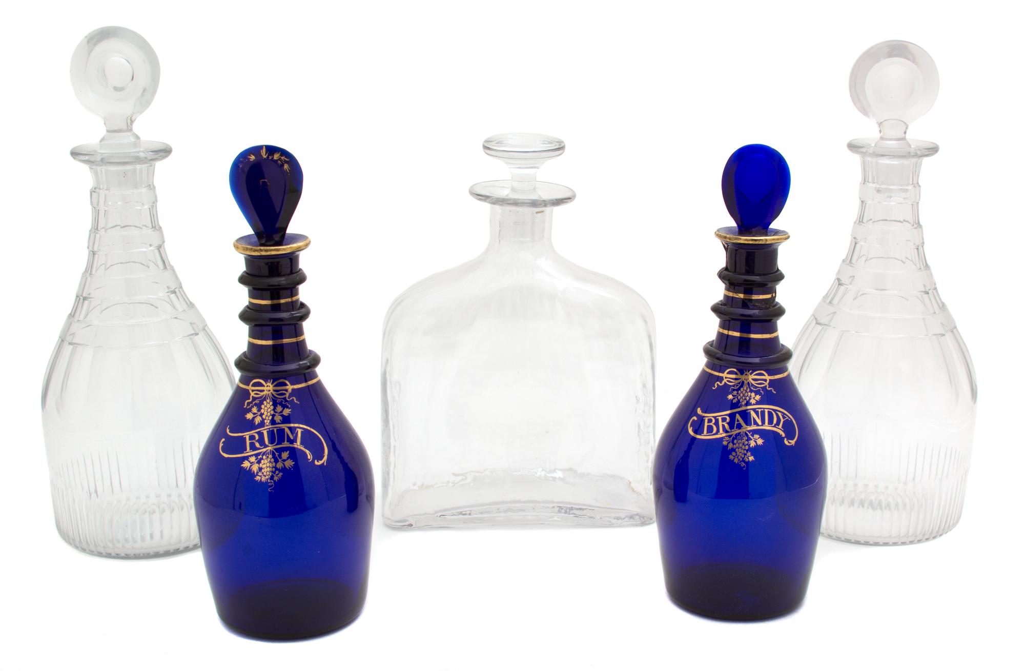 Four Miscellaneous English Glass Decanters Height of largest 11 1/2 inches. — 19TH CENTURY