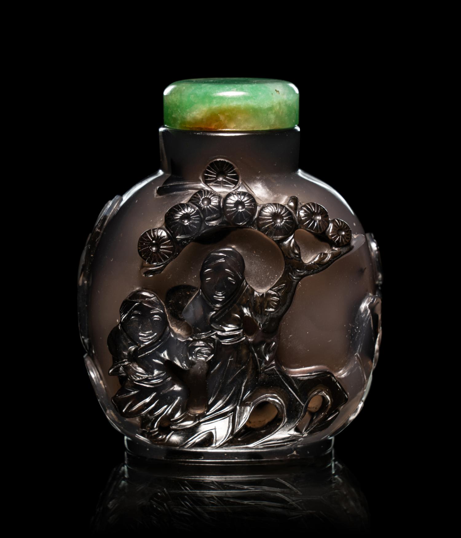 Two Carved Agate 'Fu Lion' Snuff Bottles