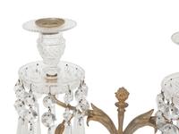 A Pair of Regency Style Gilt Bronze and Cut Glass Two-Light Candelabra
