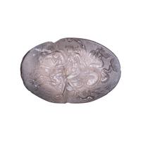 A Roman Smokey Quartz Intaglio with a Nereid Riding Two Hippocamps