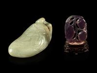 A Celadon Jade 'Lychee' Carving and An Amethyst 'Fruit' Pendant