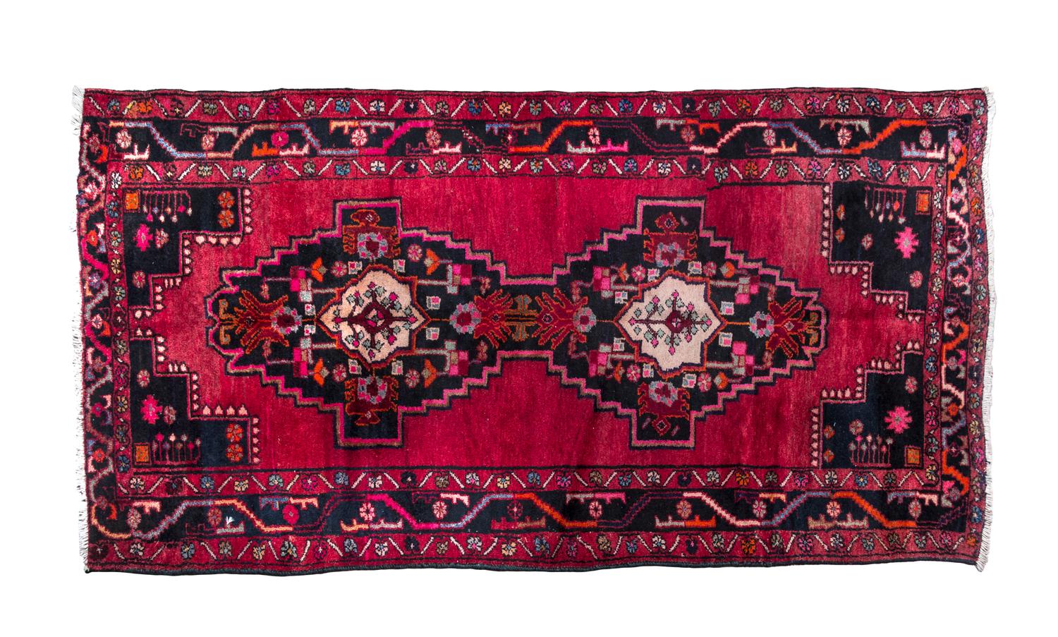 A Caucasian Wool Rug 7 feet 1 inch x 4 feet.