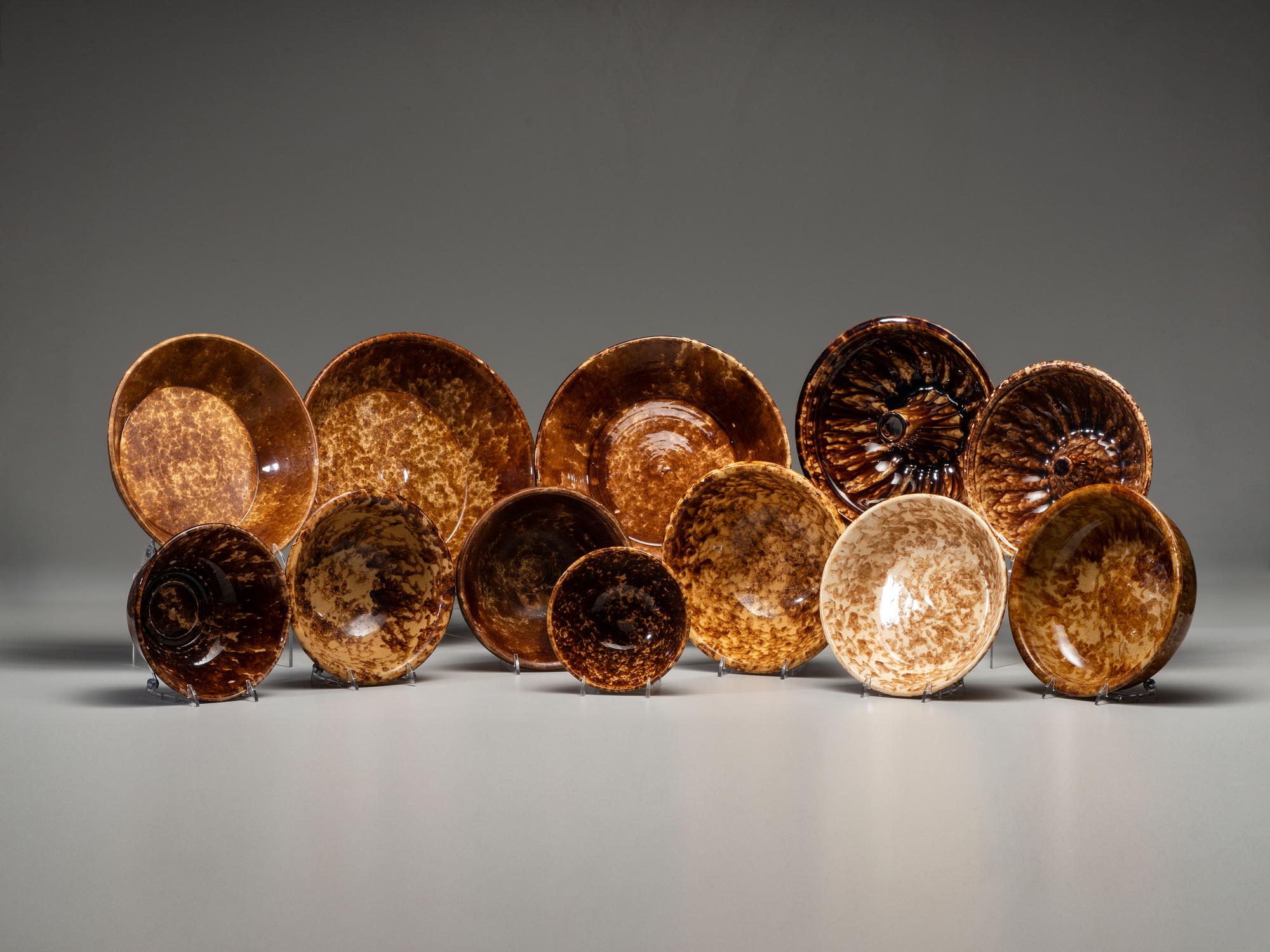 Twelve Rockingham Glaze Bowls and Molds