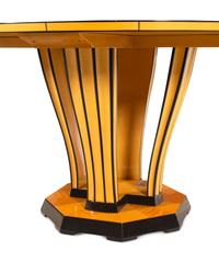 A Part-Ebonized Birch Dining Set