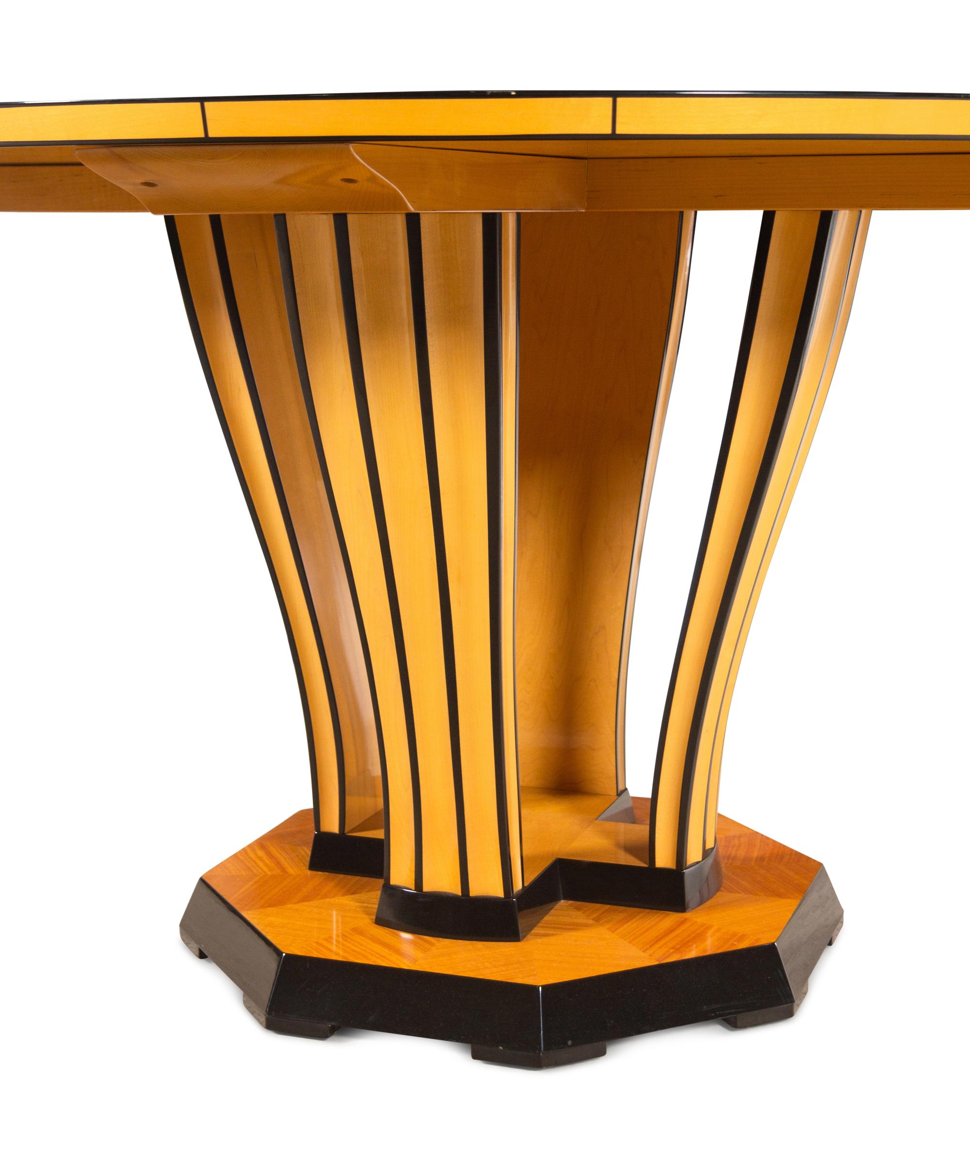 A Part-Ebonized Birch Dining Set