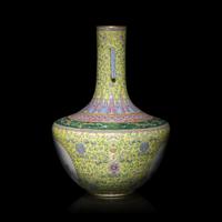 A Chinese Yellow Ground Famille Rose Porcelain 'Floral' Vase, Dated 1947 — 1947年作 ’蔣瓷‘黃地粉彩開光花鳥圖雙耳瓶