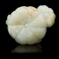 A Carved Jade Toggle Length 2 1/8 inches.