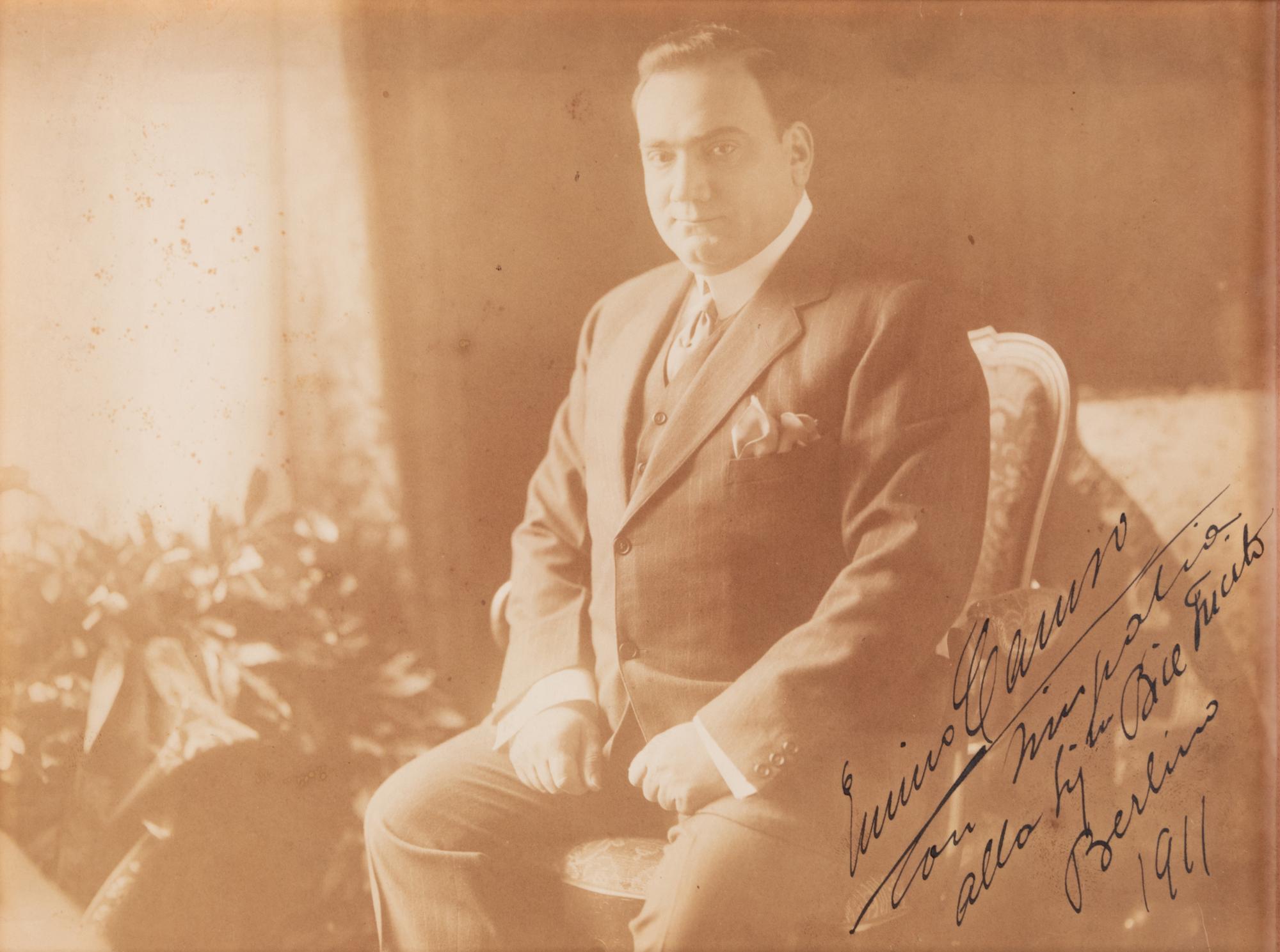 CARUSO, Enrico (1873-1921). Sepia photograph signed ("Enrico Caruso"), and additionally inscribed to an unidentified recipient. Berlin, 1901.
