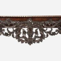 A George II Carved Mahogany Console Table Possibly after a design by Matthias Lock, first half 18th century