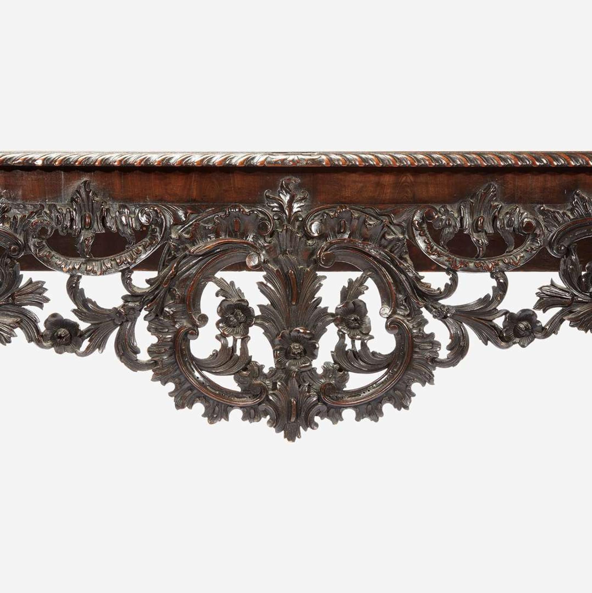 A George II Carved Mahogany Console Table Possibly after a design by Matthias Lock, first half 18th century