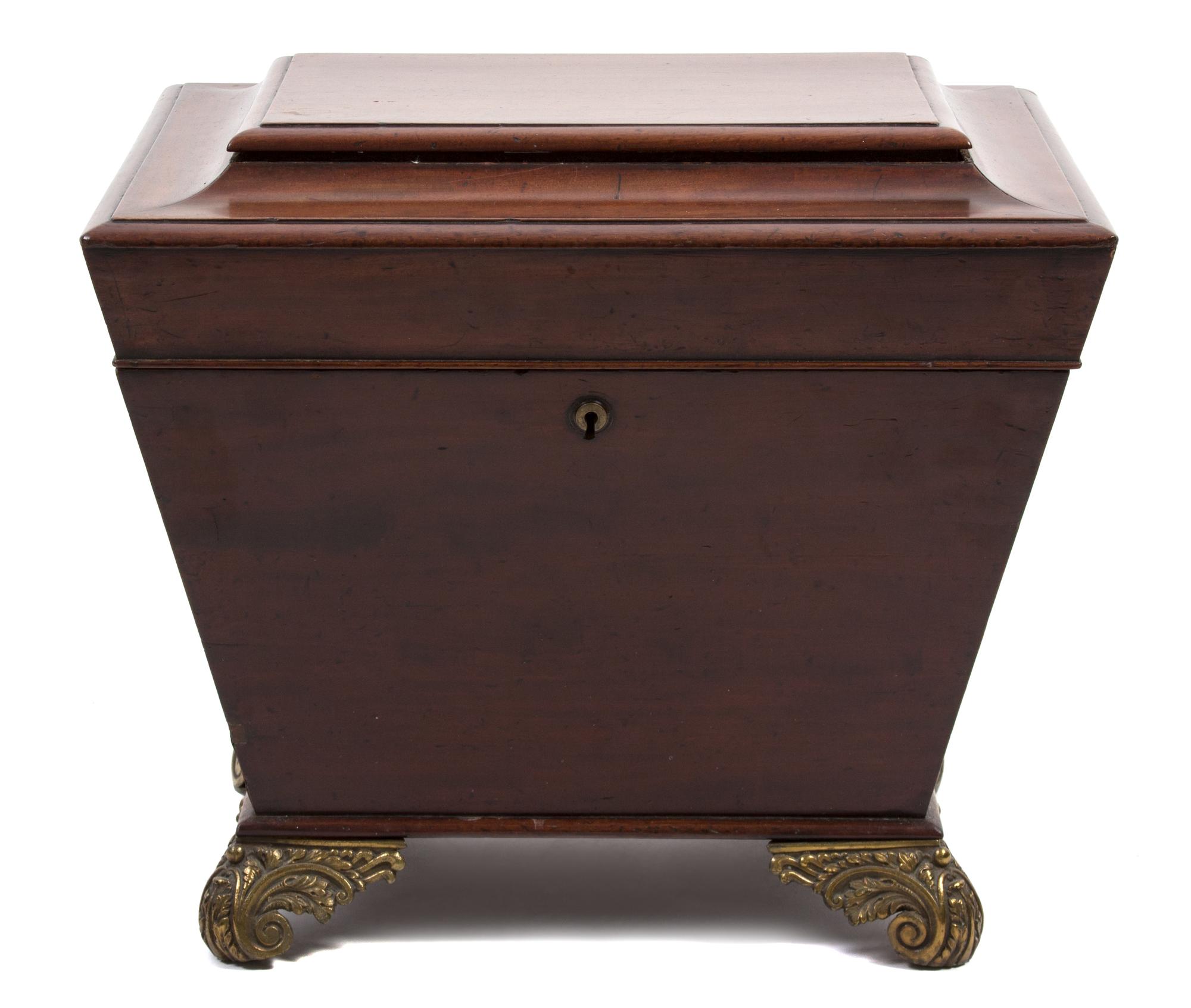A Regency Walnut Sarcophagus Wine Cooler Height 17 x width 19 1/4 x depth 15 3/4 inches. — 19TH CENTURY