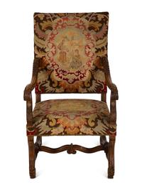 A Louis XIV Style Carved Walnut Fauteuil a la Reine