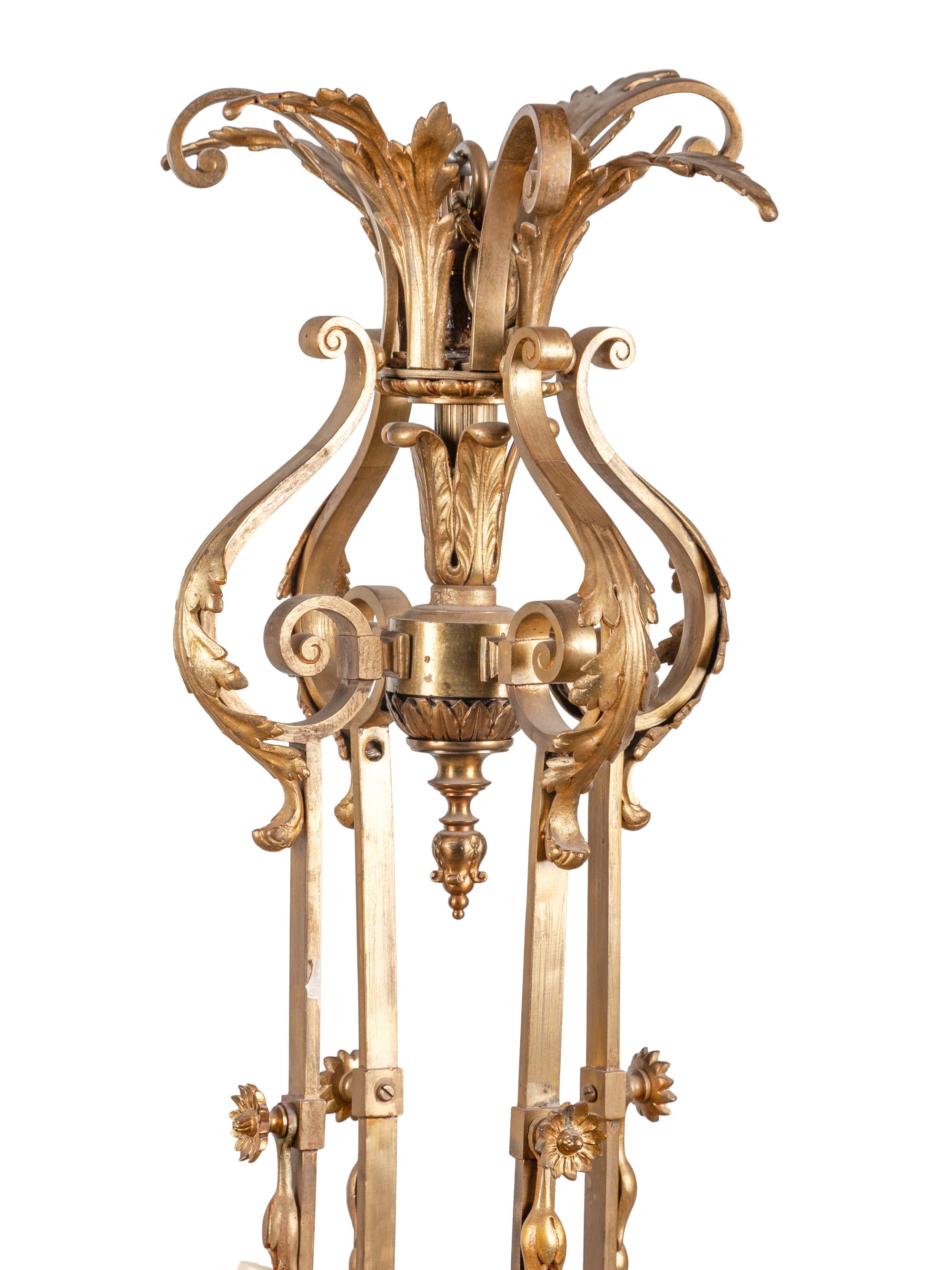 A Louis XV Style Gilt Bronze Sixteen-Light Chandelier