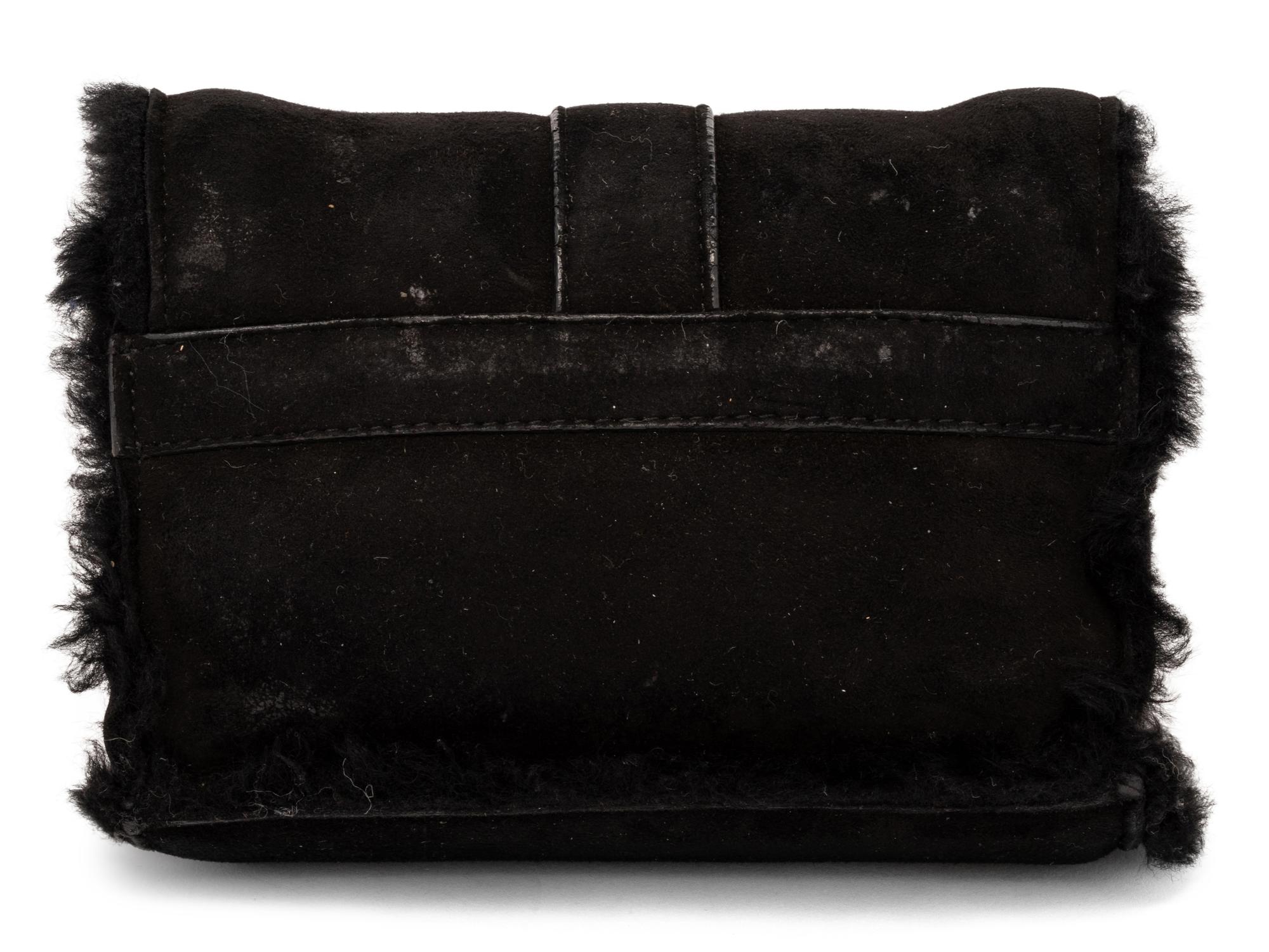 Loro Piana Cashmere Sweater and Shearling Bag