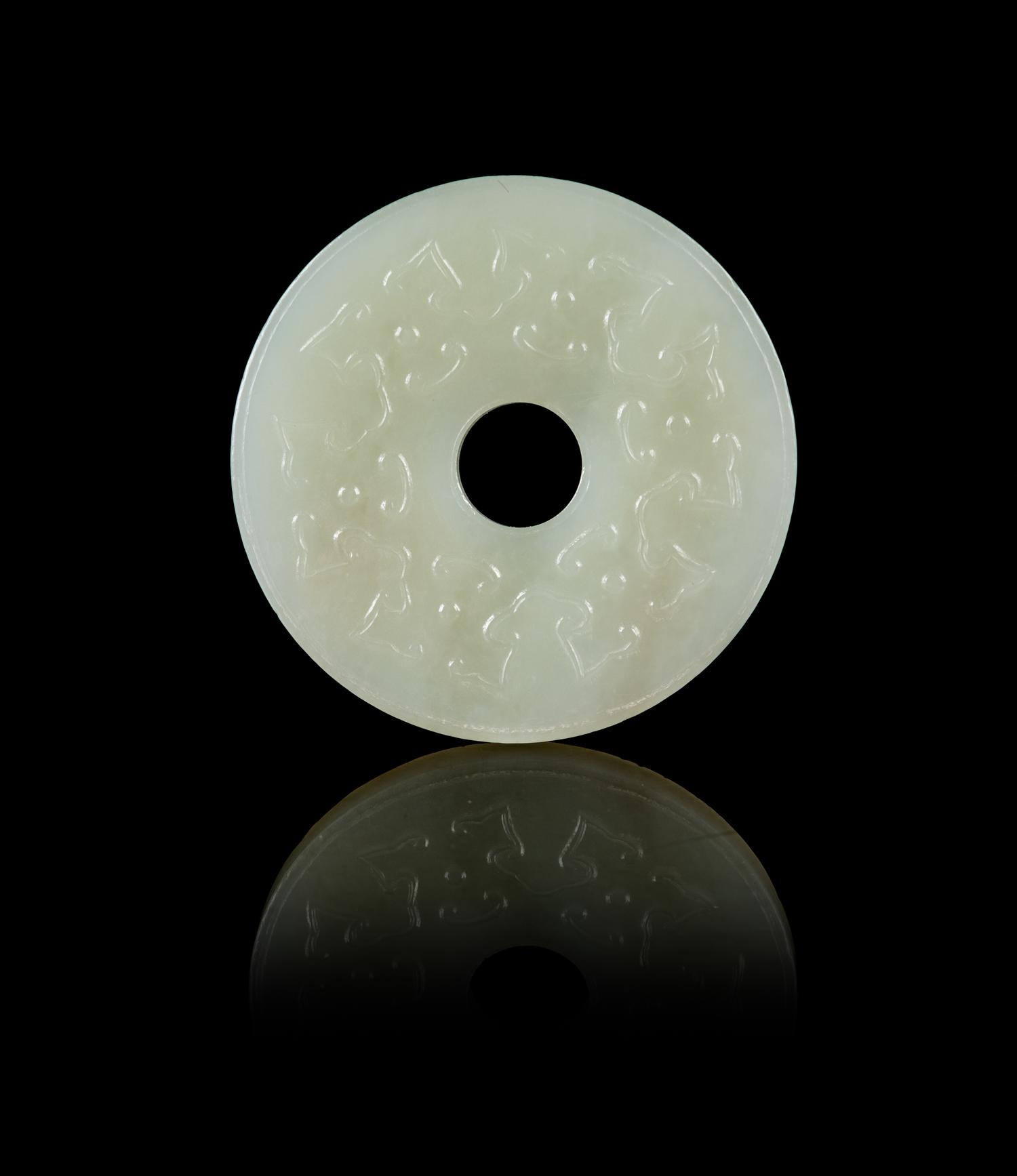 A Chinese White Jade Reticulated Bi Pendant