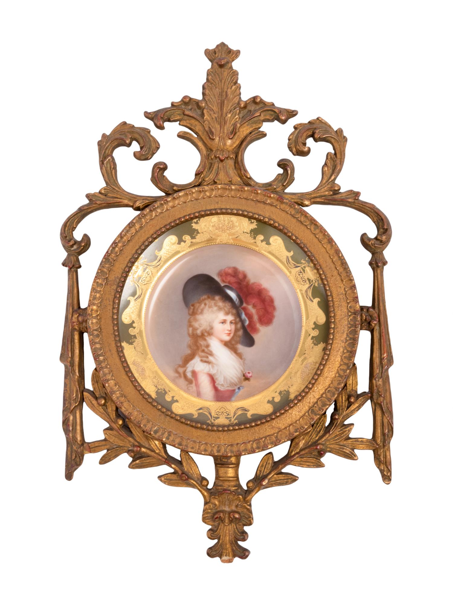 A German Porcelain Cabinet Plate in a Pierce Carved Giltwood Frame after Thomas Gainsborough (1727-1788)