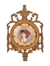 A German Porcelain Cabinet Plate in a Pierce Carved Giltwood Frame after Thomas Gainsborough (1727-1788)