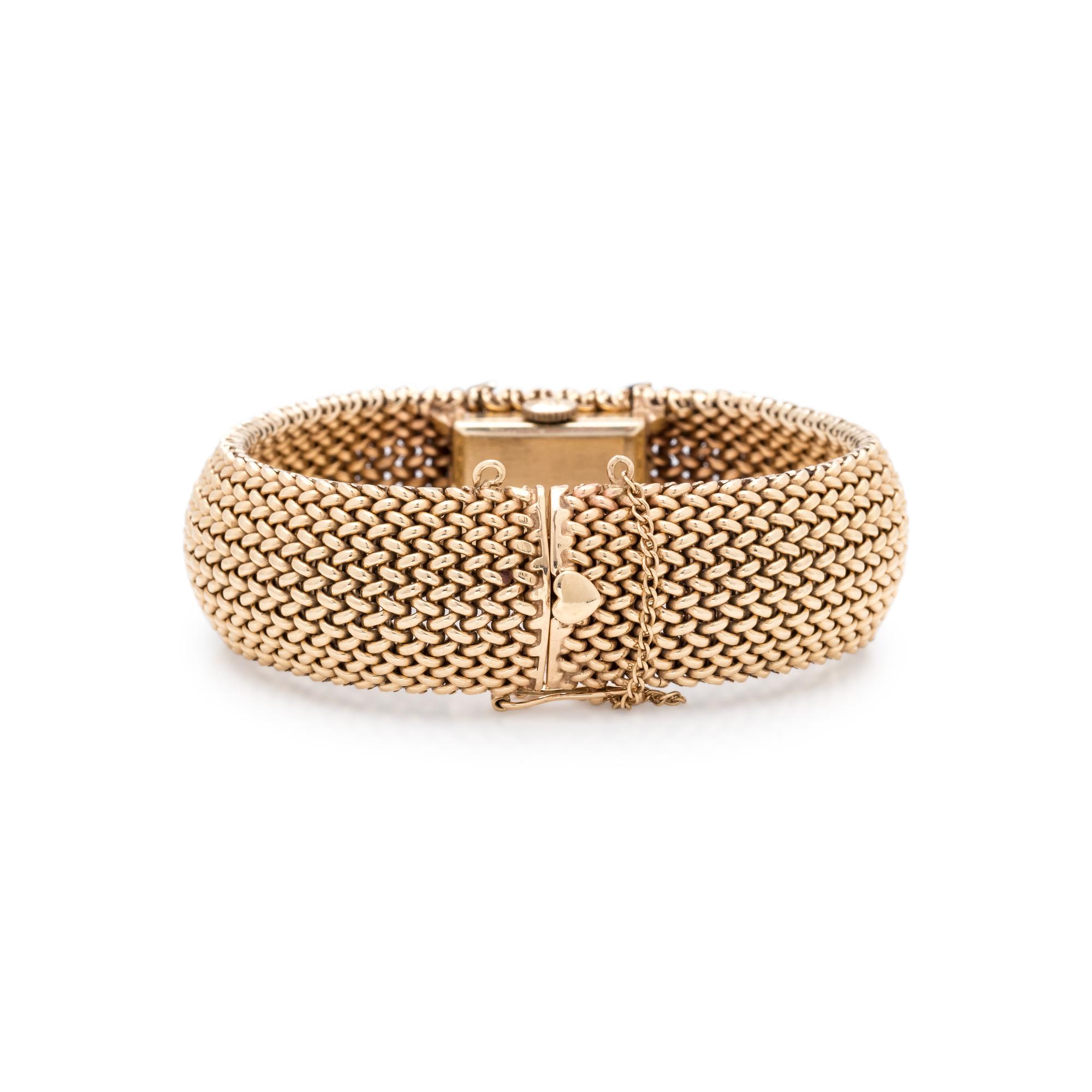 14K YELLOW GOLD AND DIAMOND SURPRISE WATCH