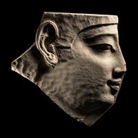 An Egyptian Limestone Sculptor's Model Fragment