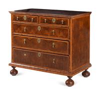 A William and Mary Oyster Walnut Chest of Drawers