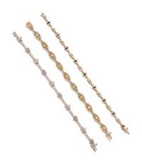COLLECTION OF GOLD AND DIAMOND LINE BRACELETS