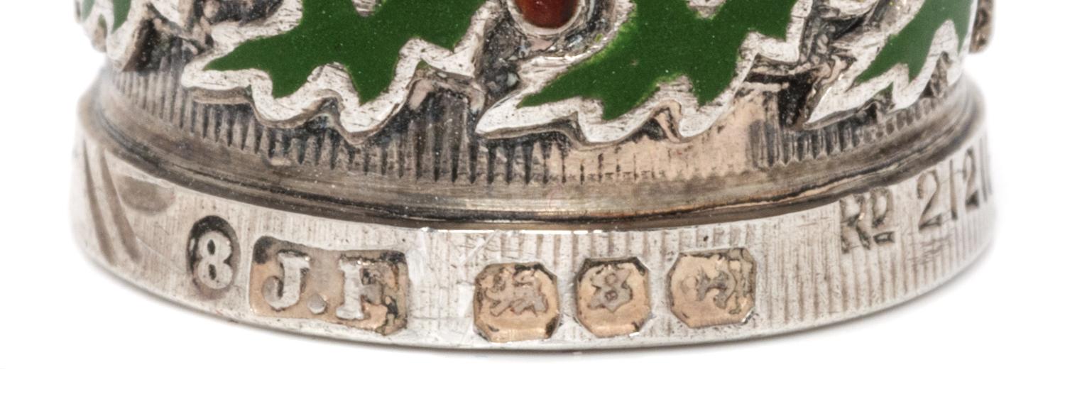 A Victorian Silver and Enamel Thimble, James Fenton, Birmingham, 1892, the knurled top and body above a polychrome enamel band decorate
