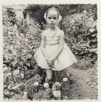 Diane Arbus (1923-1971) Girl in a party dress, NYC, 1967