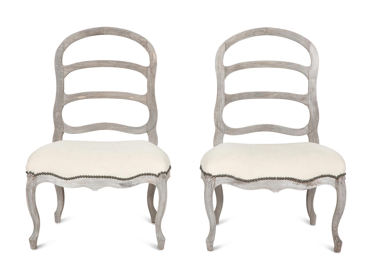 A Pair of Sutherland French Provincial Style Distressed Teak Side Chairs