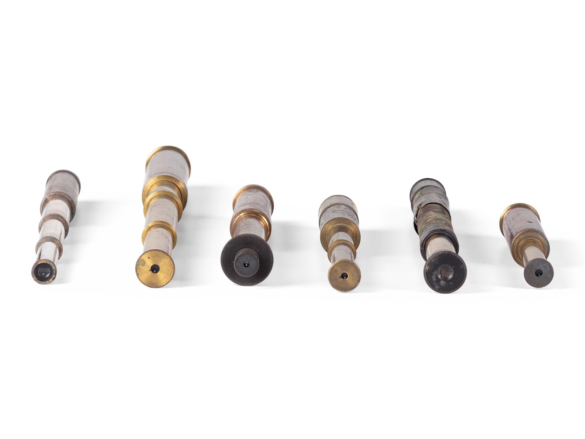A group of 6 handheld telescopes found in the workshop of George W. Fitz, Peconic, New York.