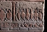 An Egyptian Polychrome Relief with Offering to the Aten