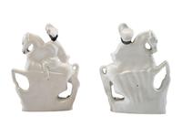 A Pair of Staffordshire Equestrian Figures