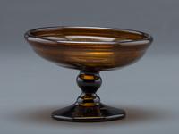 A Blown-Glass Compote in Amber