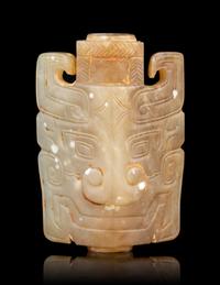 A Small Archaistic Jade Mask-Form Ornament
