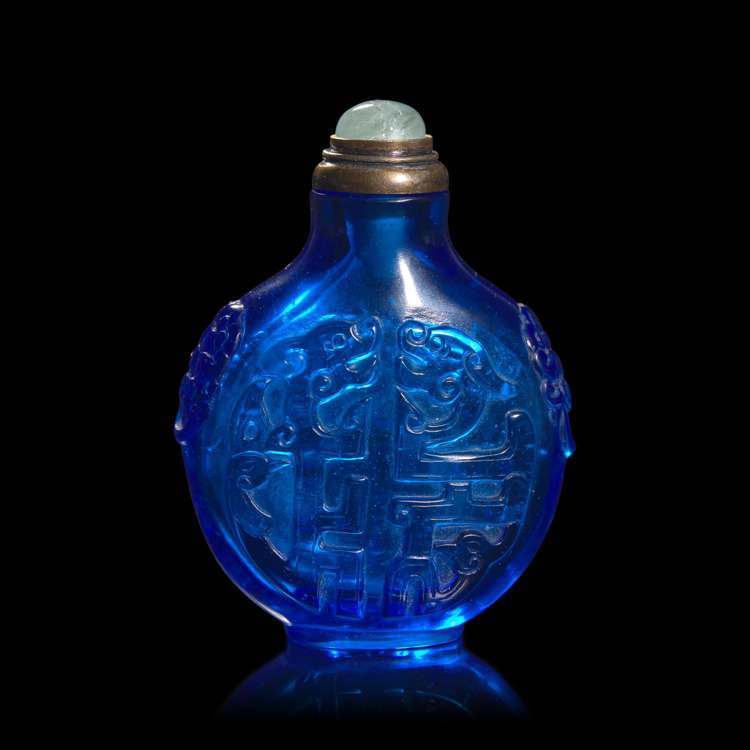 A Chinese Carved Sapphire Blue Glass "Archaistic Scrolls" Snuff Bottle
