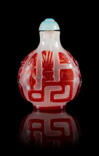 A Ruby Red Overlay Snowflake Ground Snuff Bottle Height 2 3/4 inches.