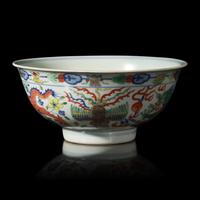 A Chinese Wucai Porcelain 'Dragon and Phoenix' Bowl, Qianlong Mark and of The Period 清乾隆 五彩龍鳳紋宮盌