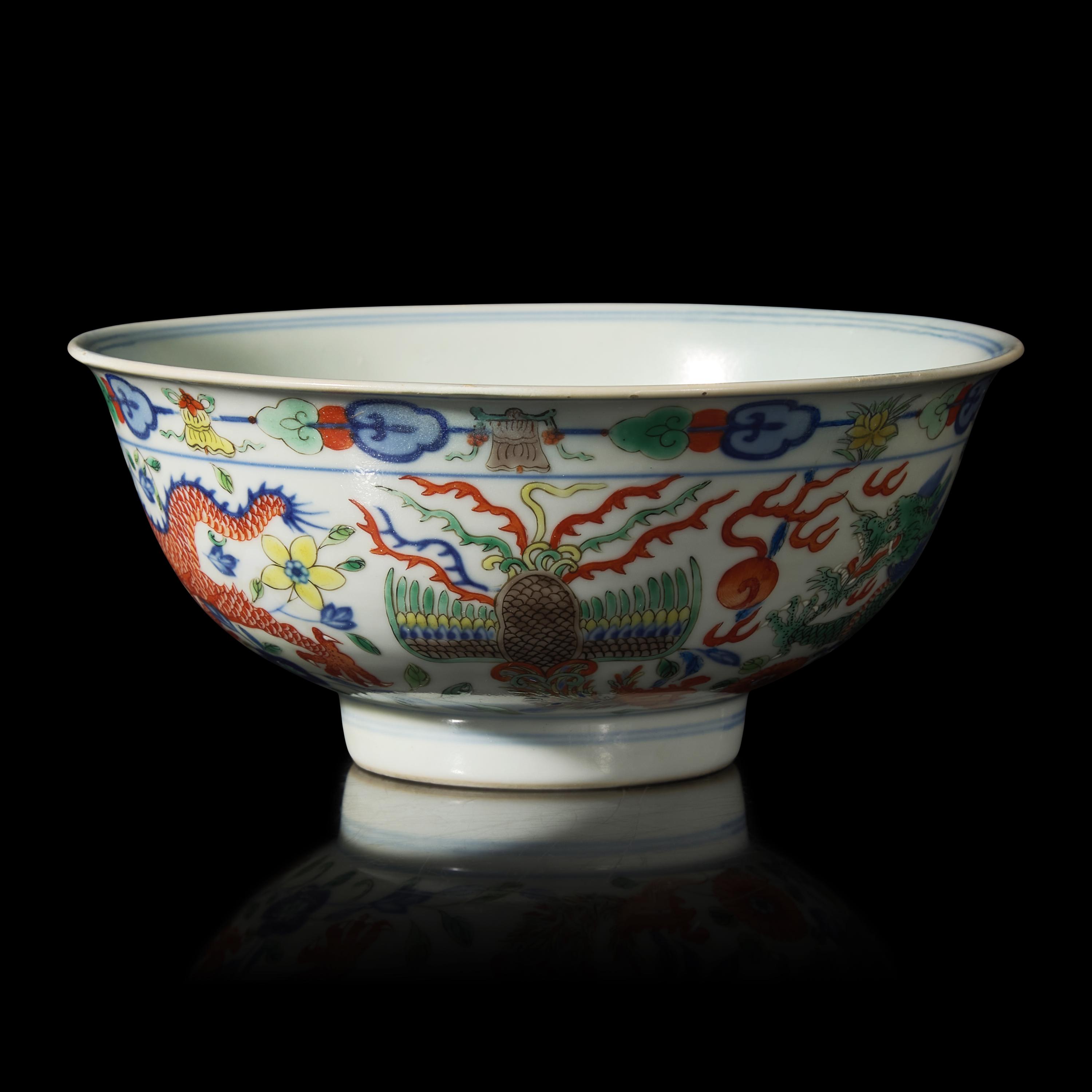A Chinese Wucai Porcelain 'Dragon and Phoenix' Bowl, Qianlong Mark and of The Period 清乾隆 五彩龍鳳紋宮盌