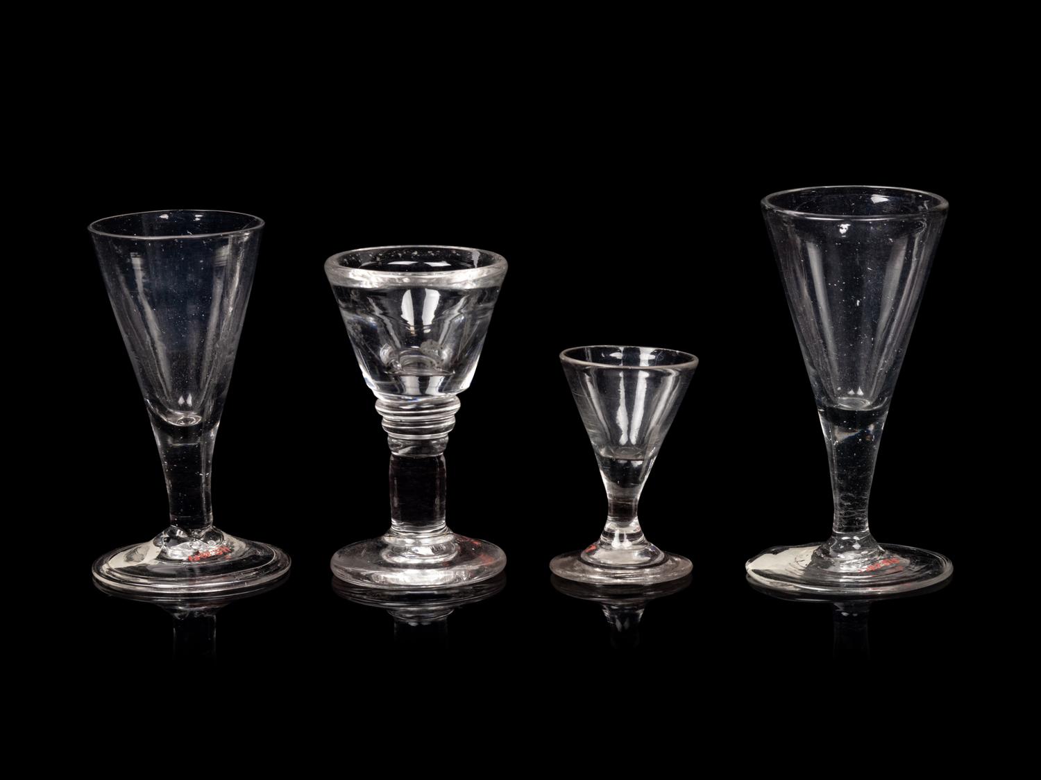 A Group of Three English Wine Stems and an American Wine Stem