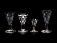 A Group of Three English Wine Stems and an American Wine Stem