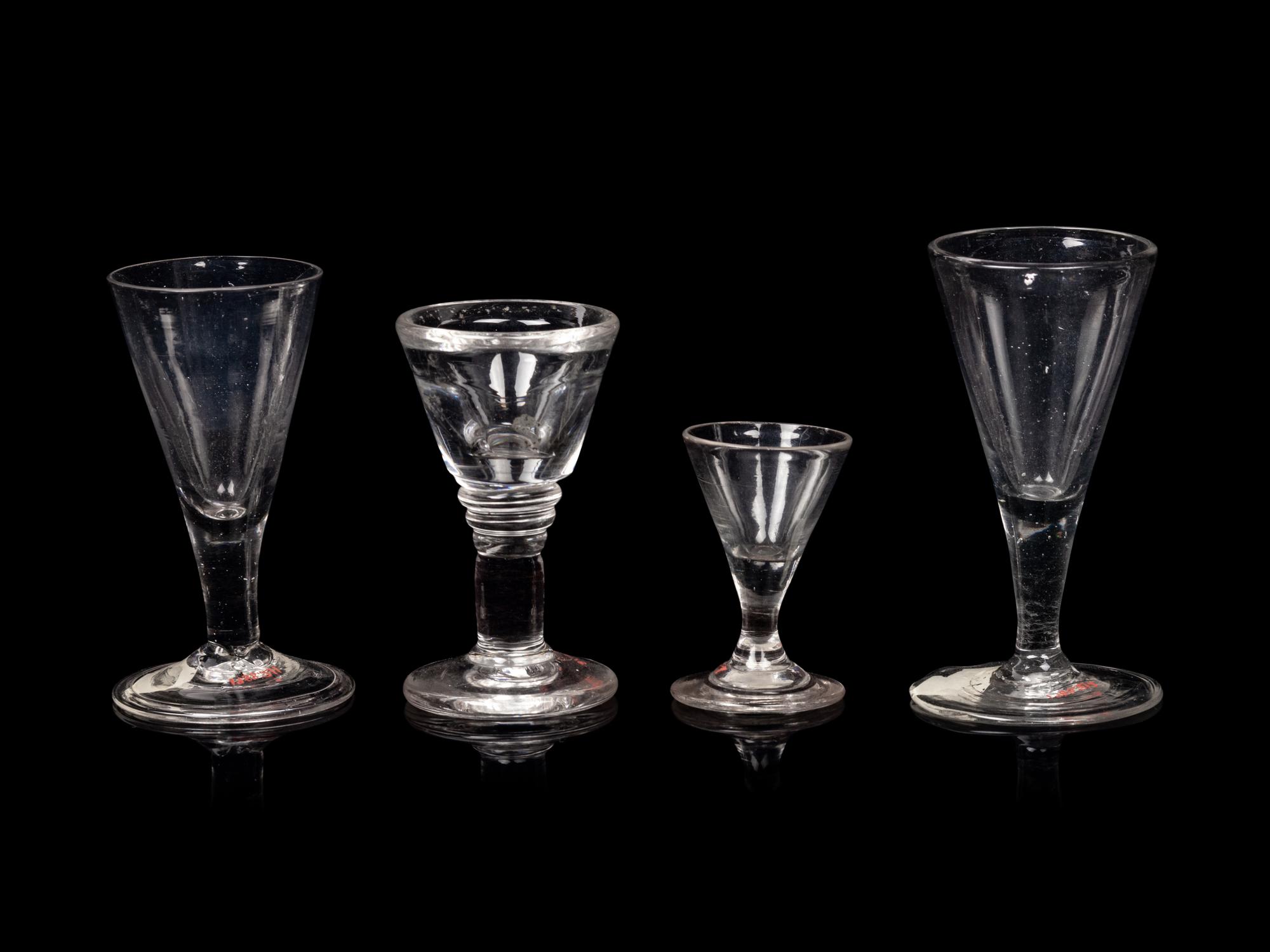 A Group of Three English Wine Stems and an American Wine Stem