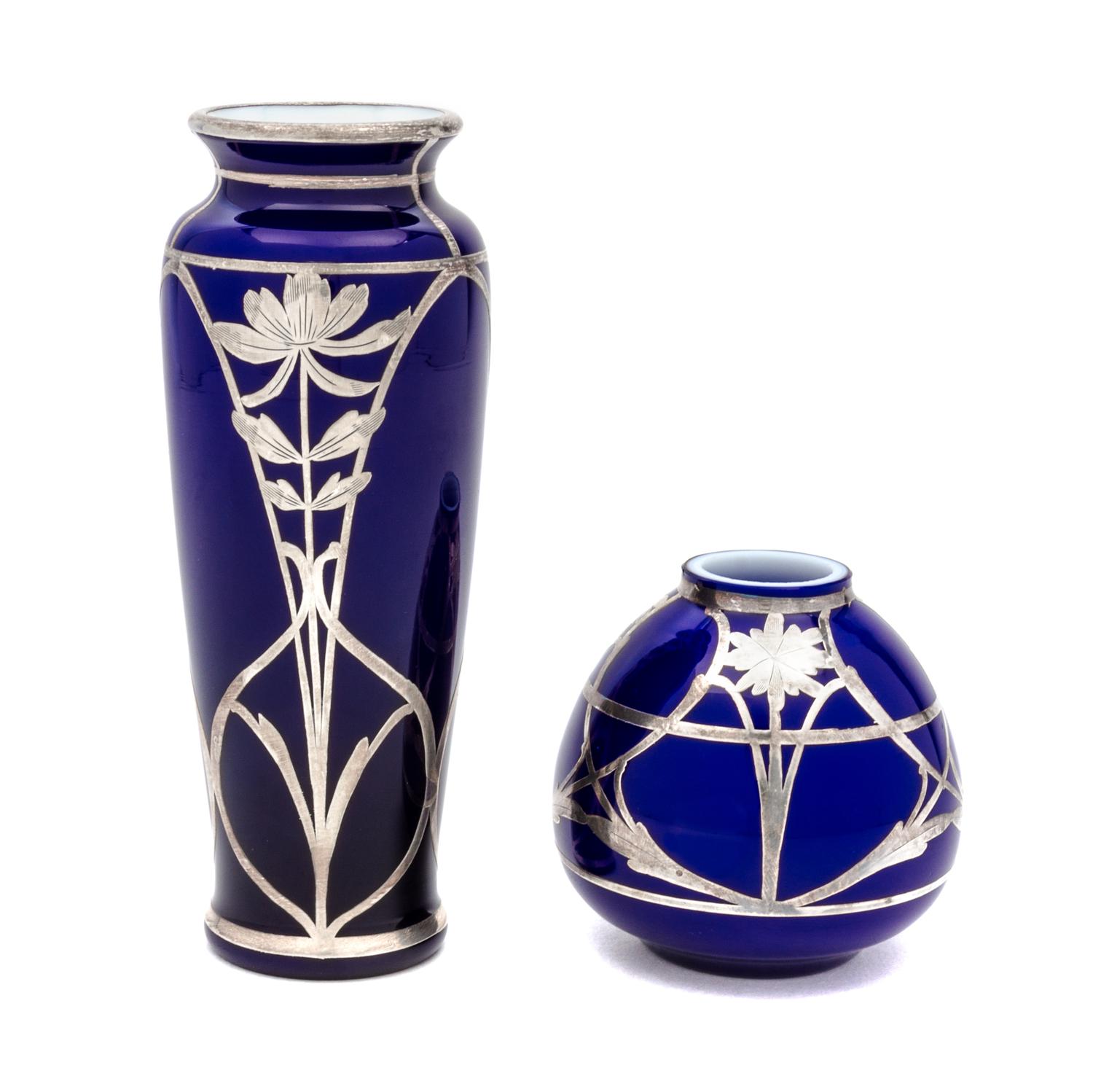 Two Silver Overlay Cased Glass Vases Height of taller 6 inches.