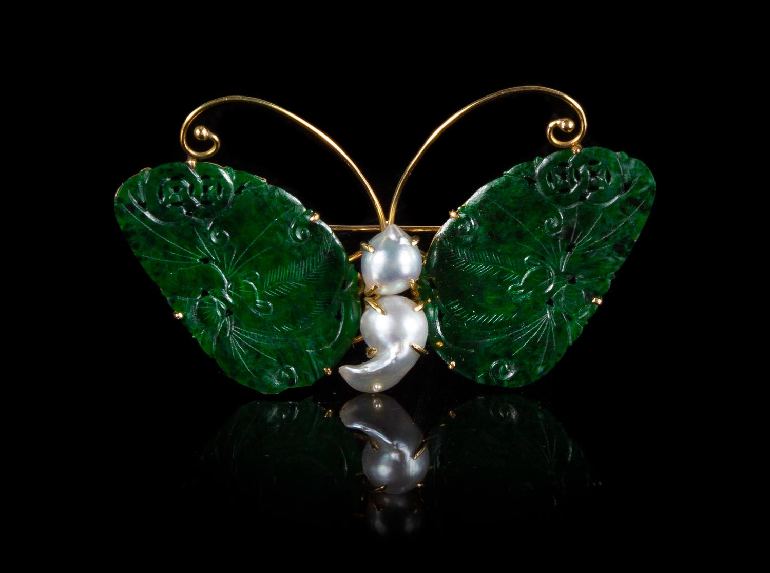 A Spinach Green Jade and Pearl Inset 14K Yellow Gold Mounted Butterfy-Form Brooch Length 2 3/4 inches.