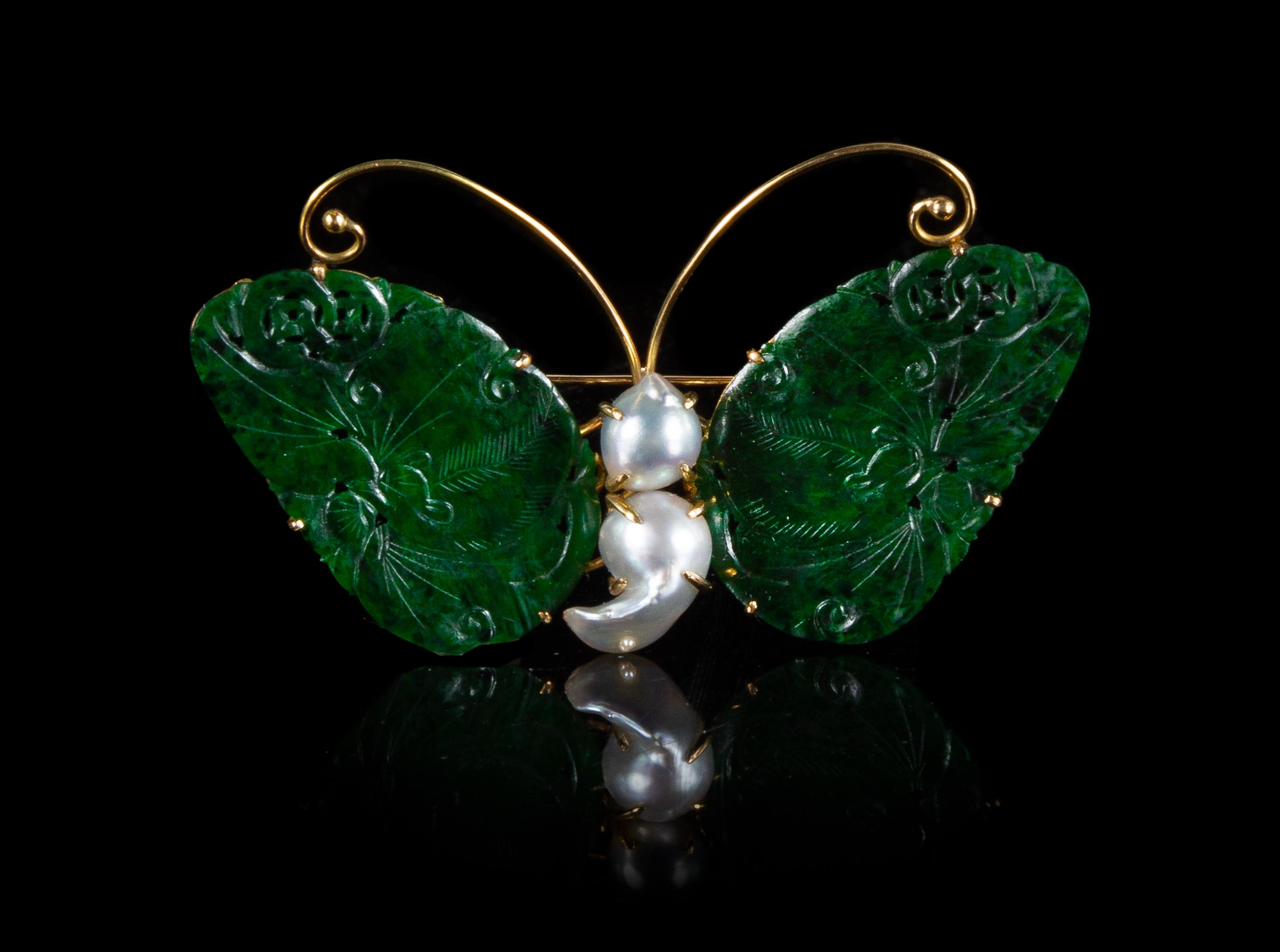 A Spinach Green Jade and Pearl Inset 14K Yellow Gold Mounted Butterfy-Form Brooch Length 2 3/4 inches.