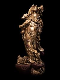 A Chinese Gilt Lacquered Wood Figure of Immortal