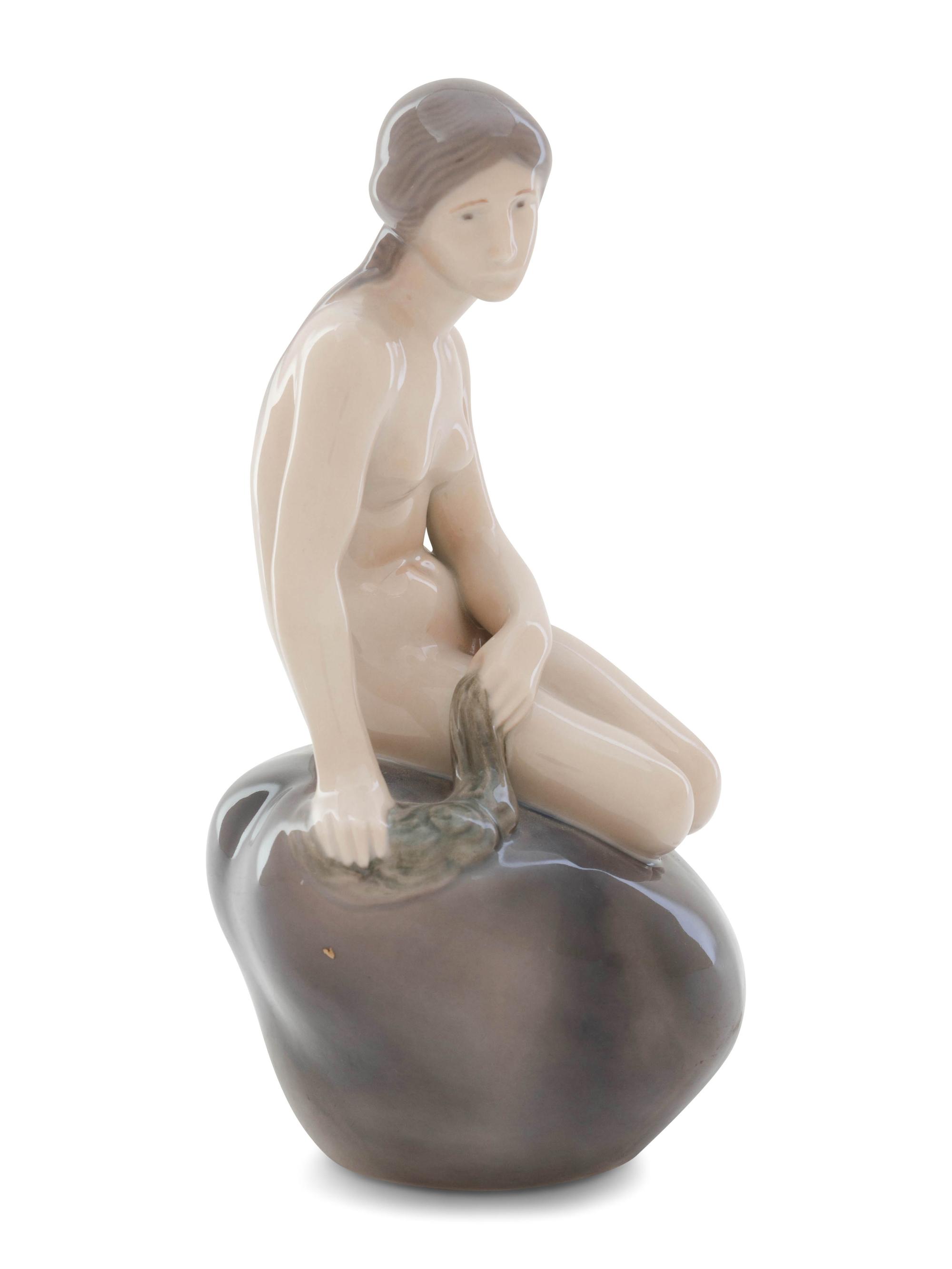 A Royal Copenhagen Porcelain Figure of a Mermaid