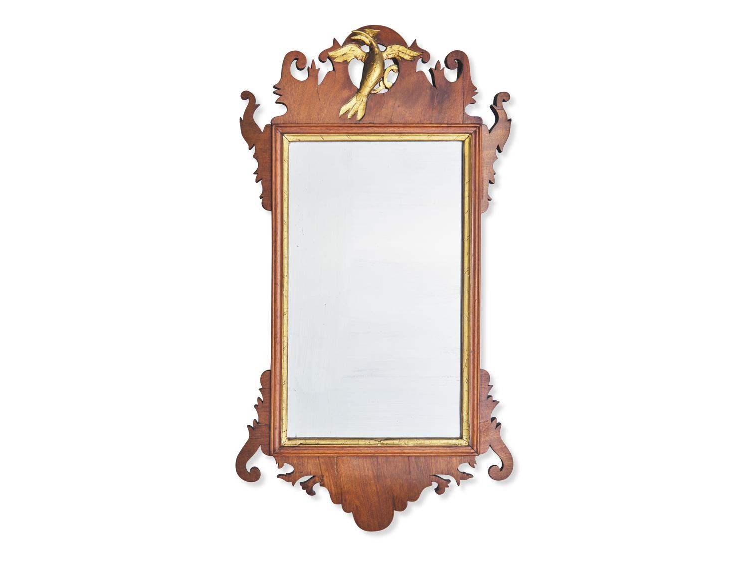 A Chippendale Fret-Carved and Parcel-Gilt Mahogany Looking Glass
