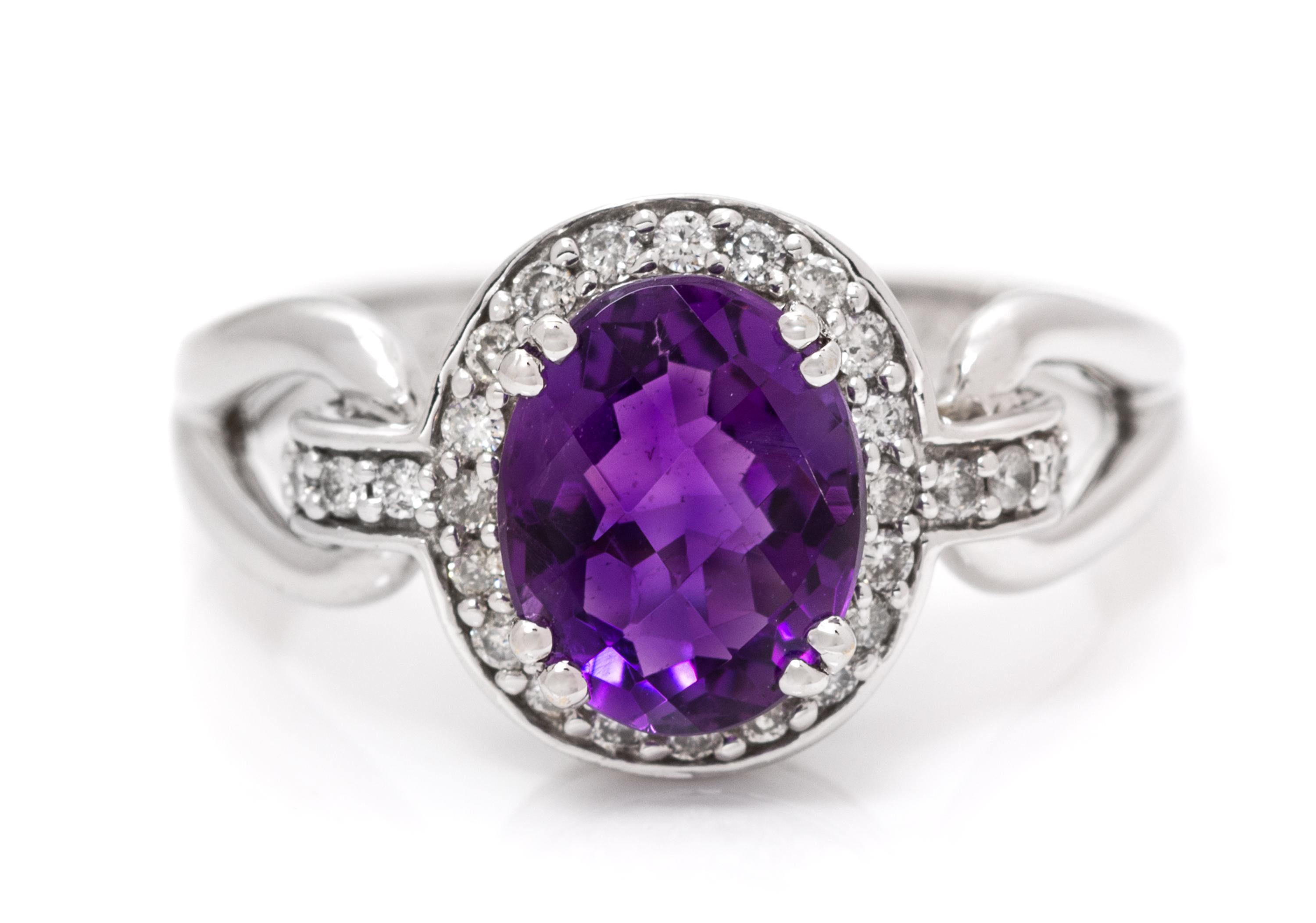 A 14 Karat White Gold, Amethyst and Diamond Ring, 2.90 dwts.
