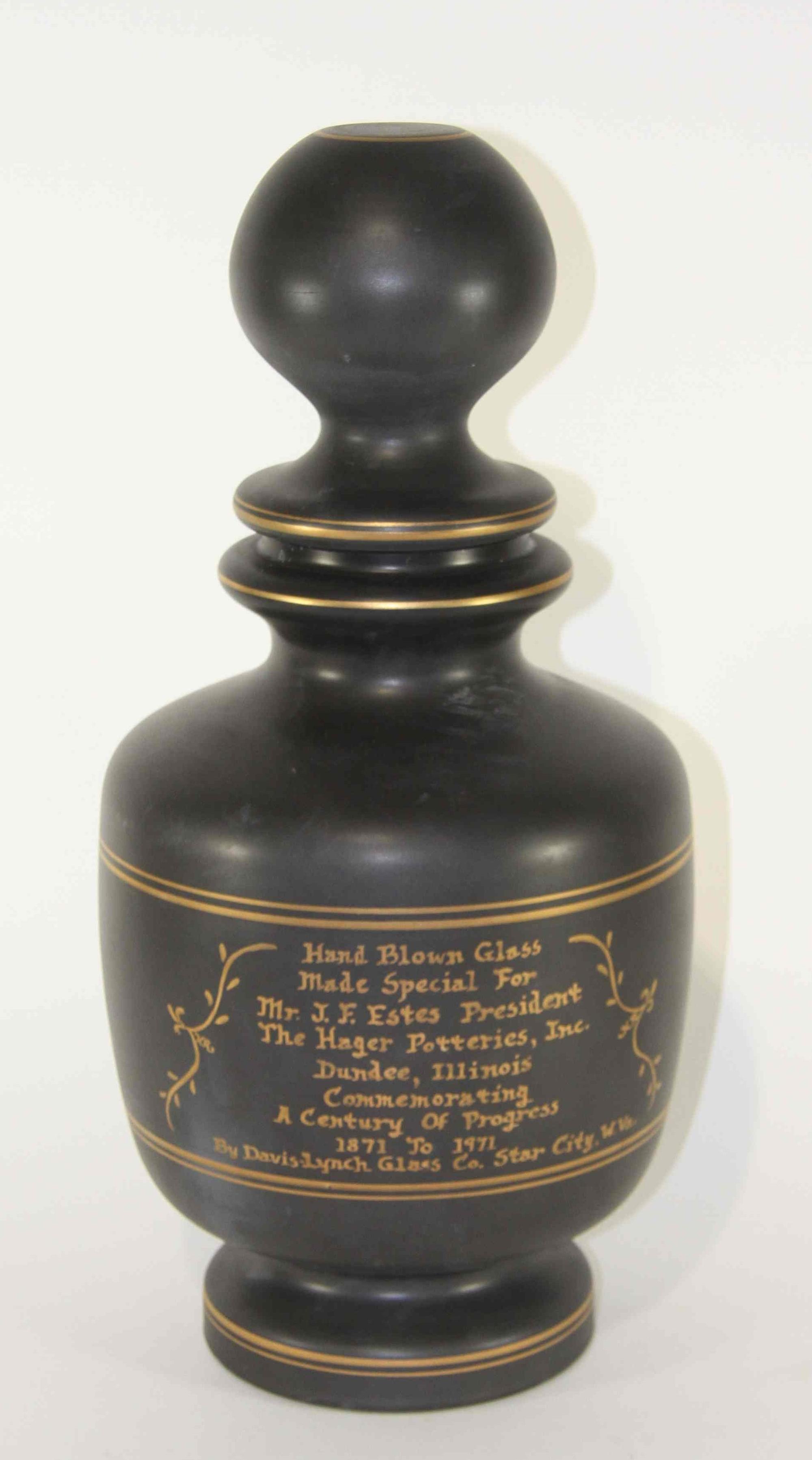 An Art Glass Commemorative Covered Urn Height 19 1/4 inches.